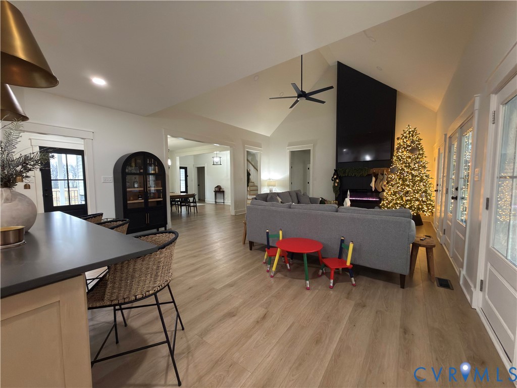 7017 Claiborne Road Sutherland, VA 23885 - Photo 25 of 62 a living room with furniture and a wooden floor