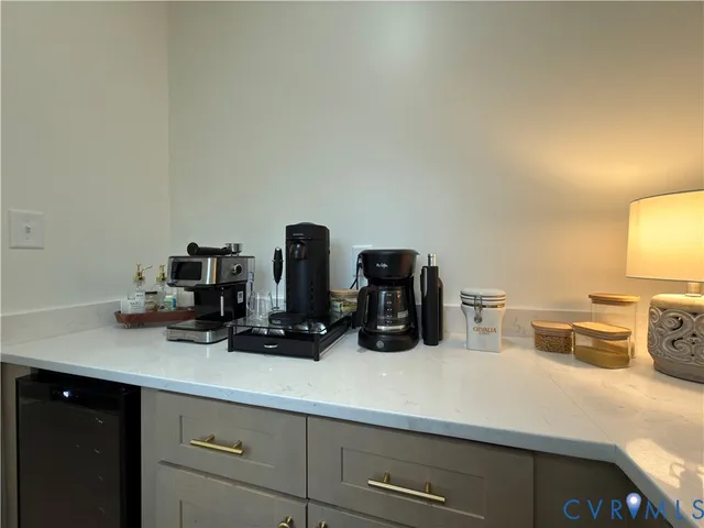 a bedroom with a bed and a flat tv screen