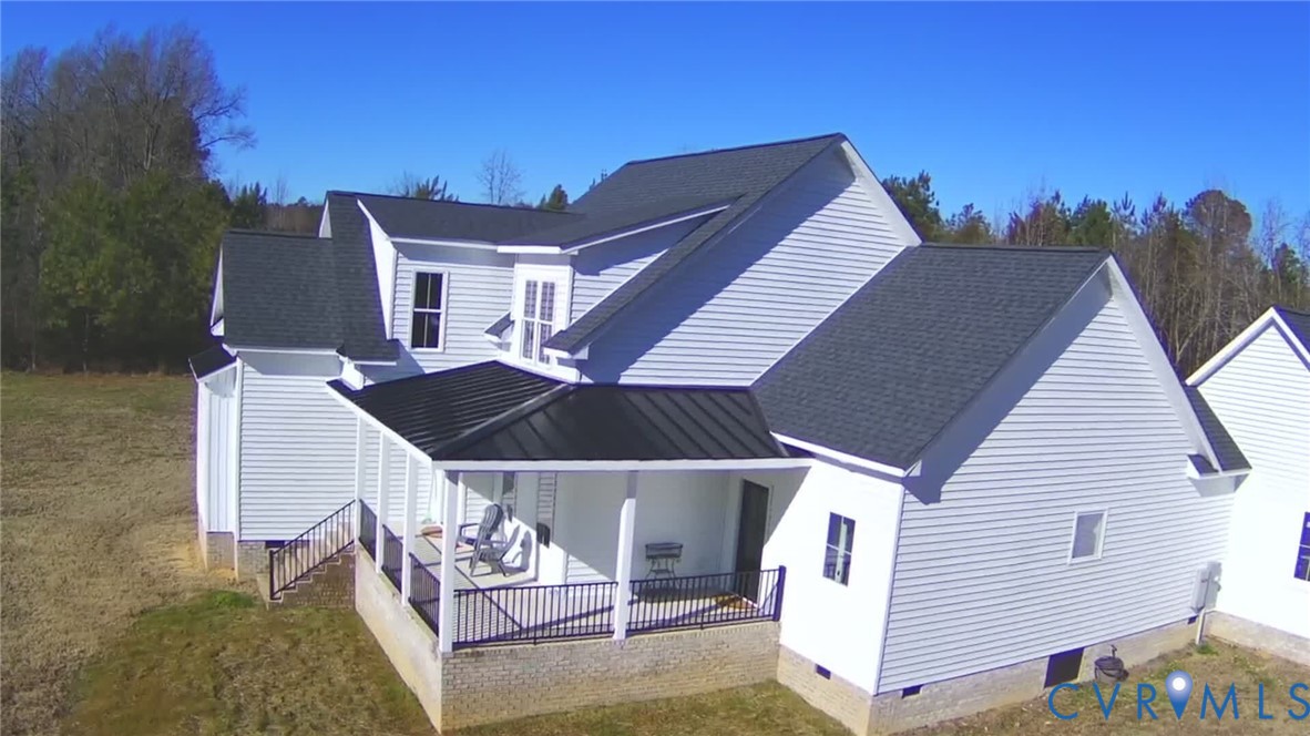 7017 Claiborne Road Sutherland, VA 23885 - Photo 3 of 62 a terrace of a house with outdoor seating
