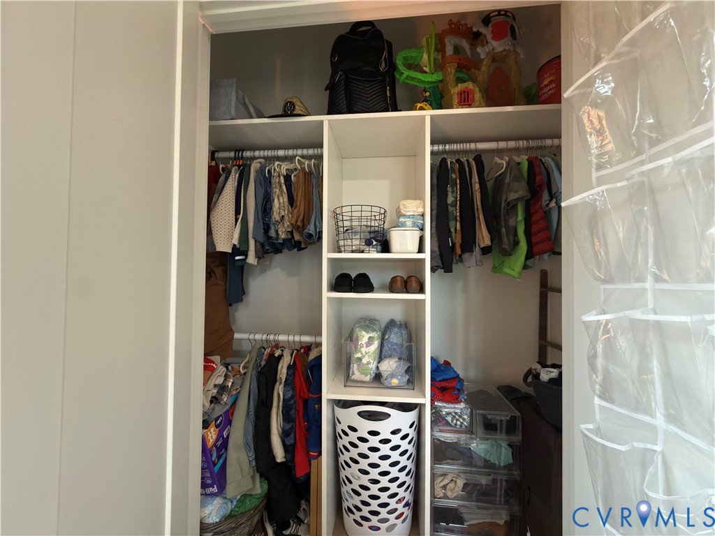 7017 Claiborne Road Sutherland, VA 23885 - Photo 39 of 62 a view of walk in closet with clothes and shoes