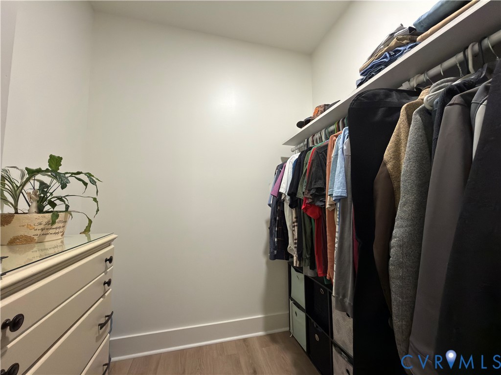 7017 Claiborne Road Sutherland, VA 23885 - Photo 40 of 62 a view of walk in closet with clothes