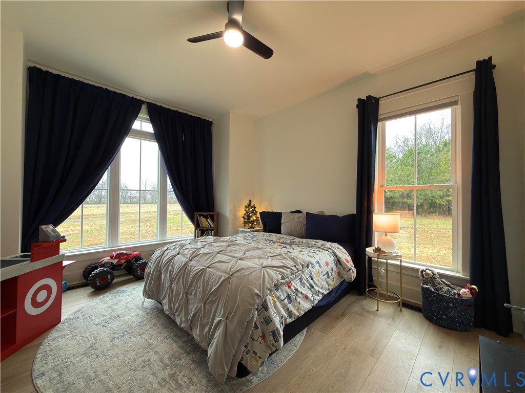 7017 Claiborne Road Sutherland, VA 23885 - Photo 43 of 62 a bedroom with a bed and a window