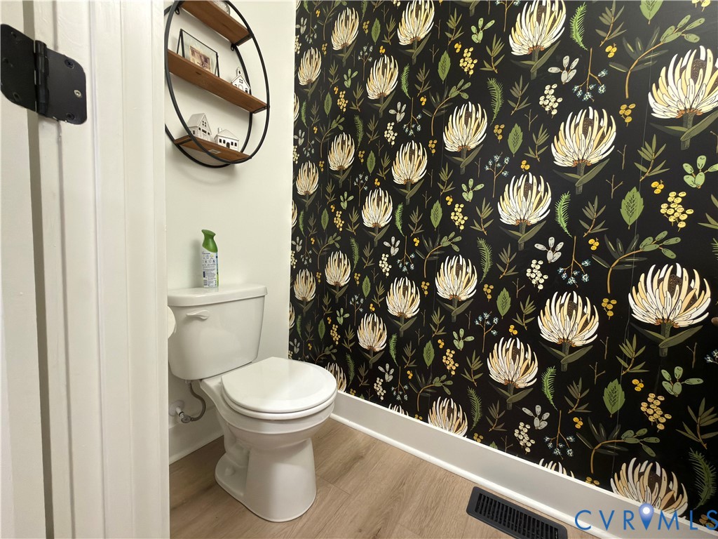 7017 Claiborne Road Sutherland, VA 23885 - Photo 46 of 62 a bathroom with a toilet and a sink