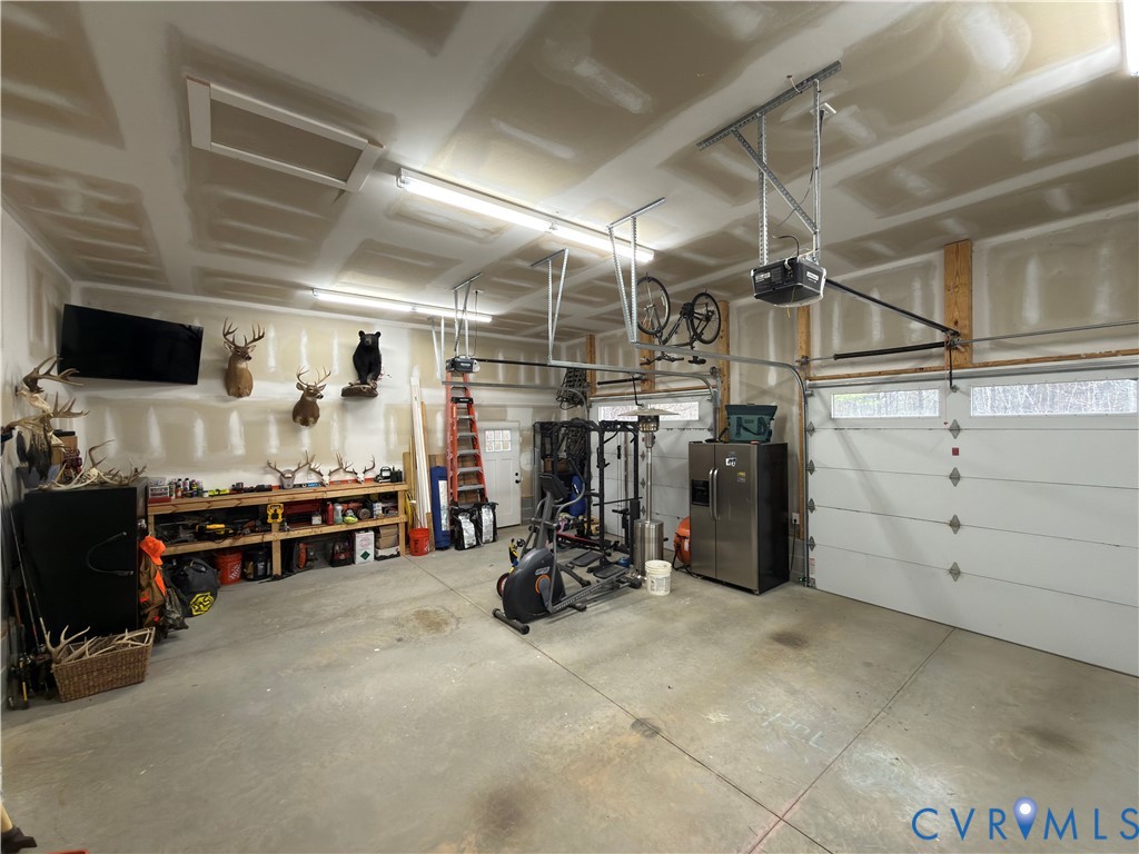7017 Claiborne Road Sutherland, VA 23885 - Photo 51 of 62 a view of a garage with storage
