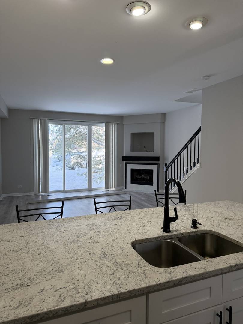 2522 Arcadia Circle Naperville, IL 60540 - Photo 5 of 18 a view of kitchen sink and natural light