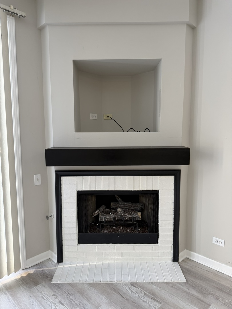 2522 Arcadia Circle Naperville, IL 60540 - Photo 7 of 18 a close view of a fireplace