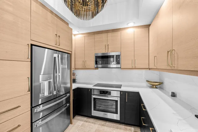 a living room with fireplace furniture and a flat screen tv