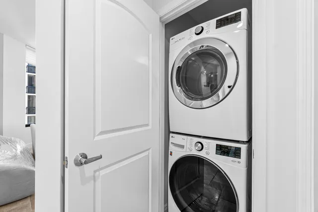 a bathroom with a shower sink and mirror