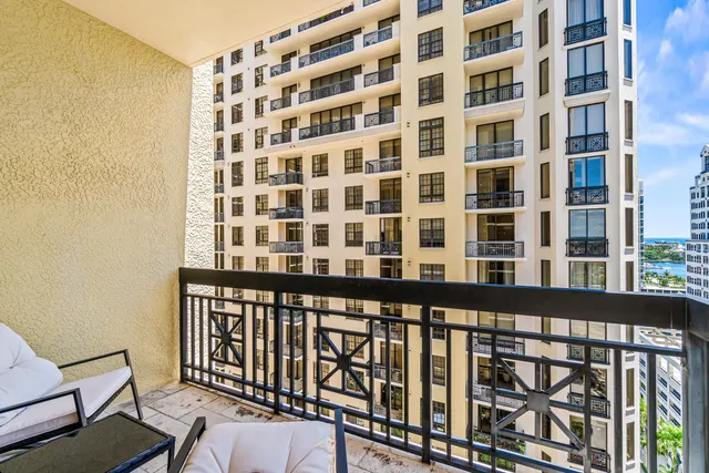 a view of a brick building from a balcony