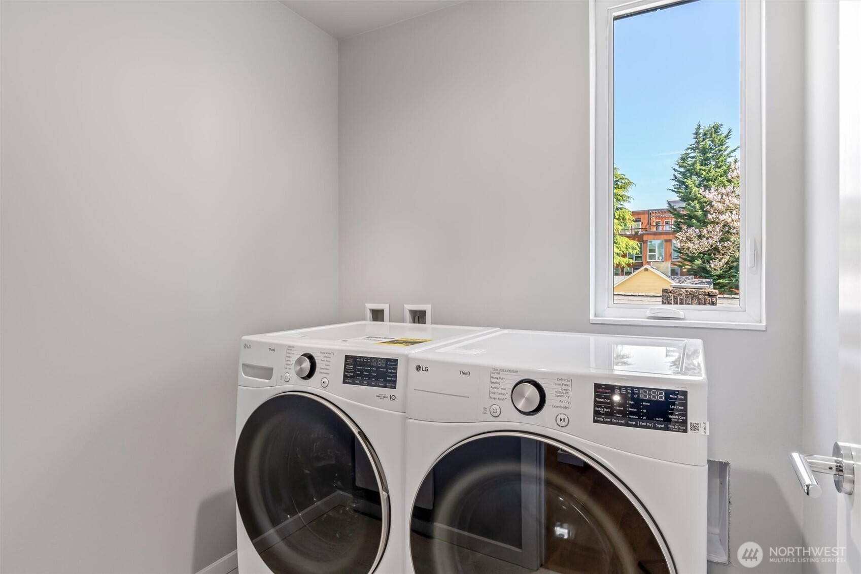 4460 Midvale Avenue North Seattle, WA 98103 - Photo 26 of 40 a utility room with dryer and washer