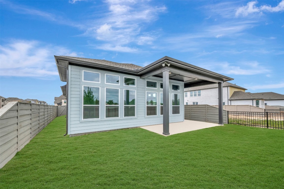 2423 Msn Hts Way Manvel, TX 77578 - Photo 11 of 49 a front view of a house with a garden
