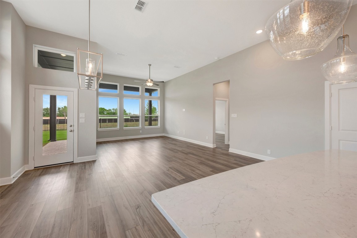 2423 Msn Hts Way Manvel, TX 77578 - Photo 30 of 49 a view of a room with wooden floor and window