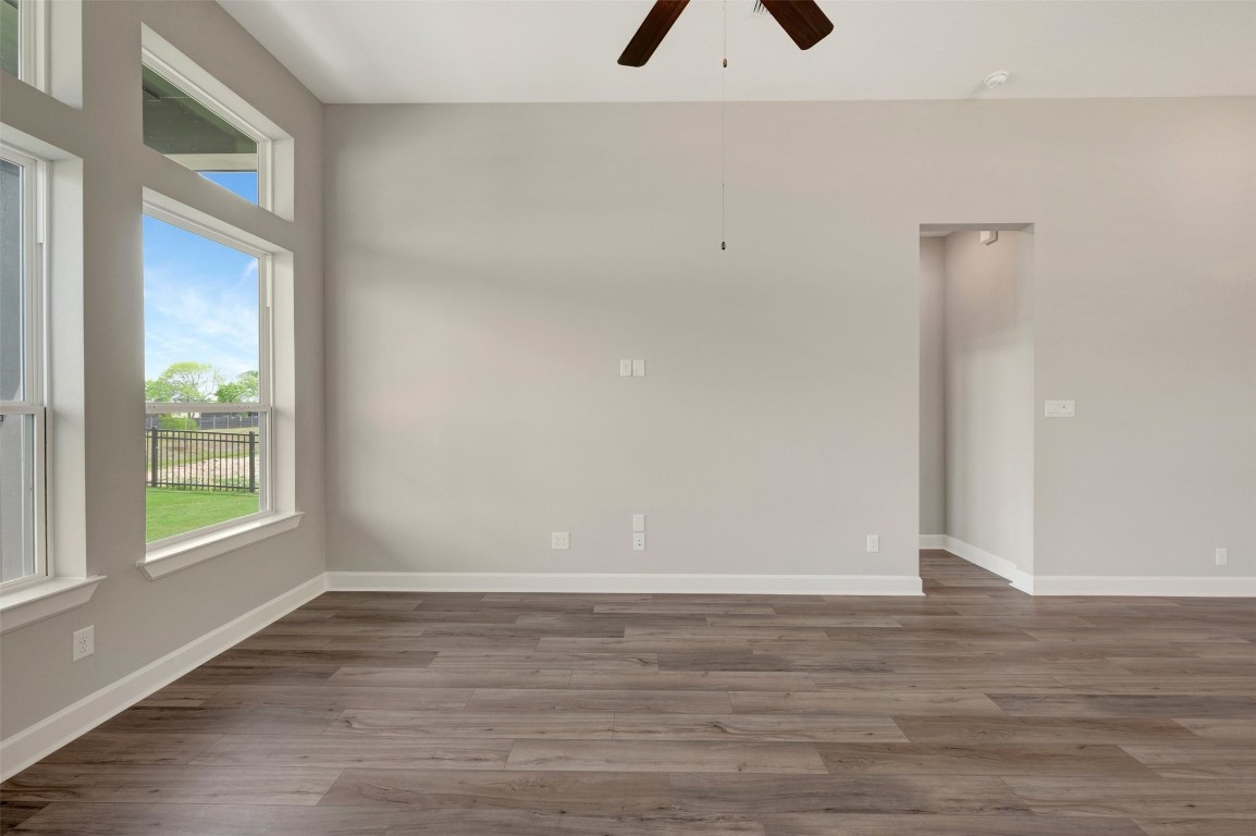 2423 Msn Hts Way Manvel, TX 77578 - Photo 35 of 49 a view of an empty room with wooden floor and a window
