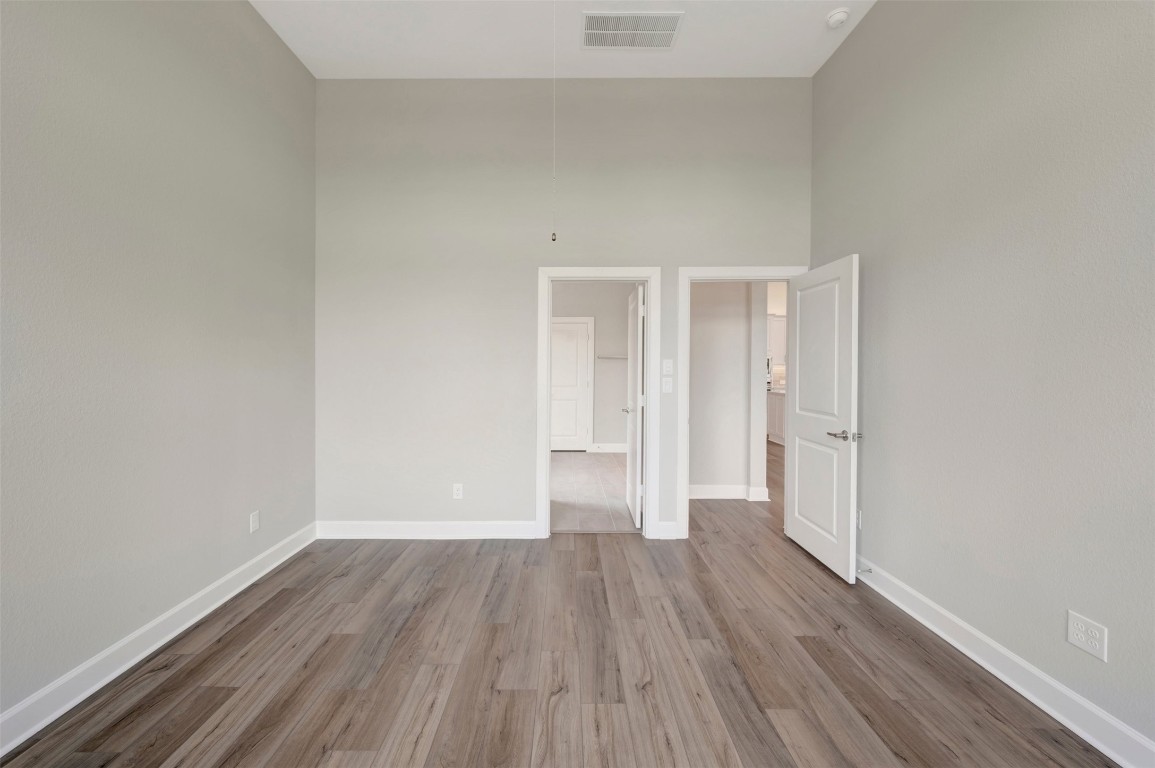 2423 Msn Hts Way Manvel, TX 77578 - Photo 39 of 49 a view of an empty room and wooden floor
