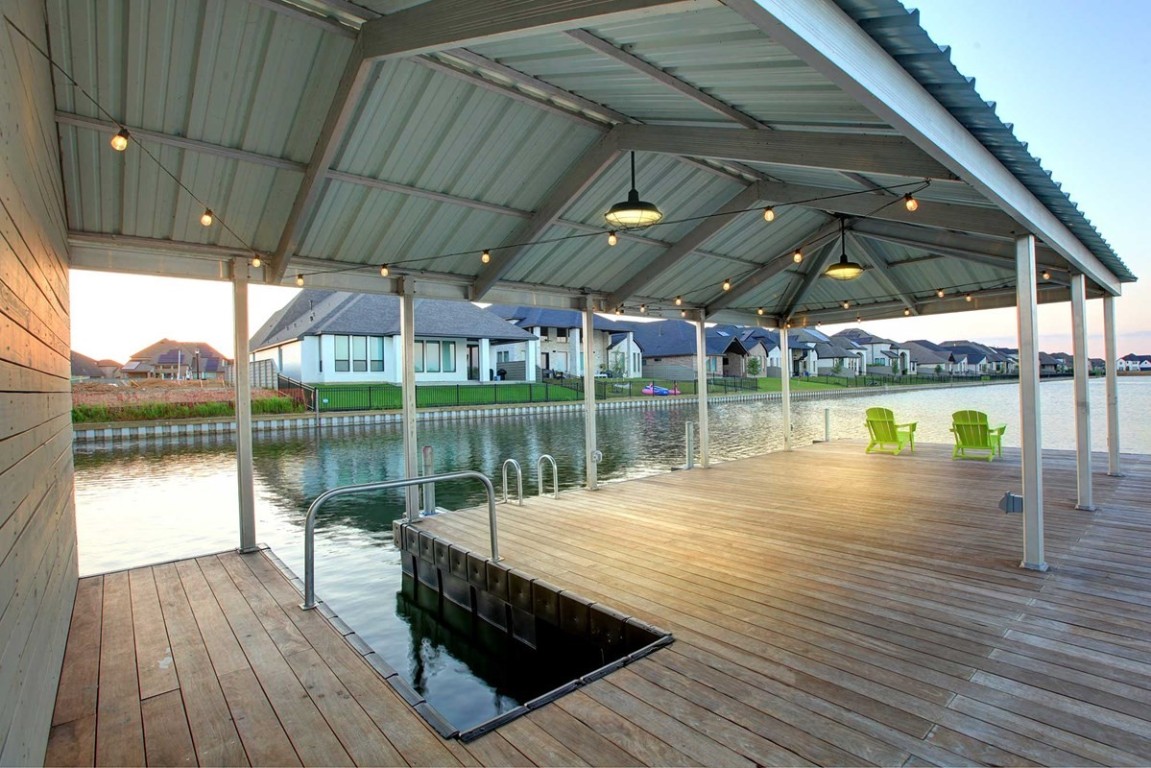 2423 Msn Hts Way Manvel, TX 77578 - Photo 46 of 49 a view of a lake from a roof deck