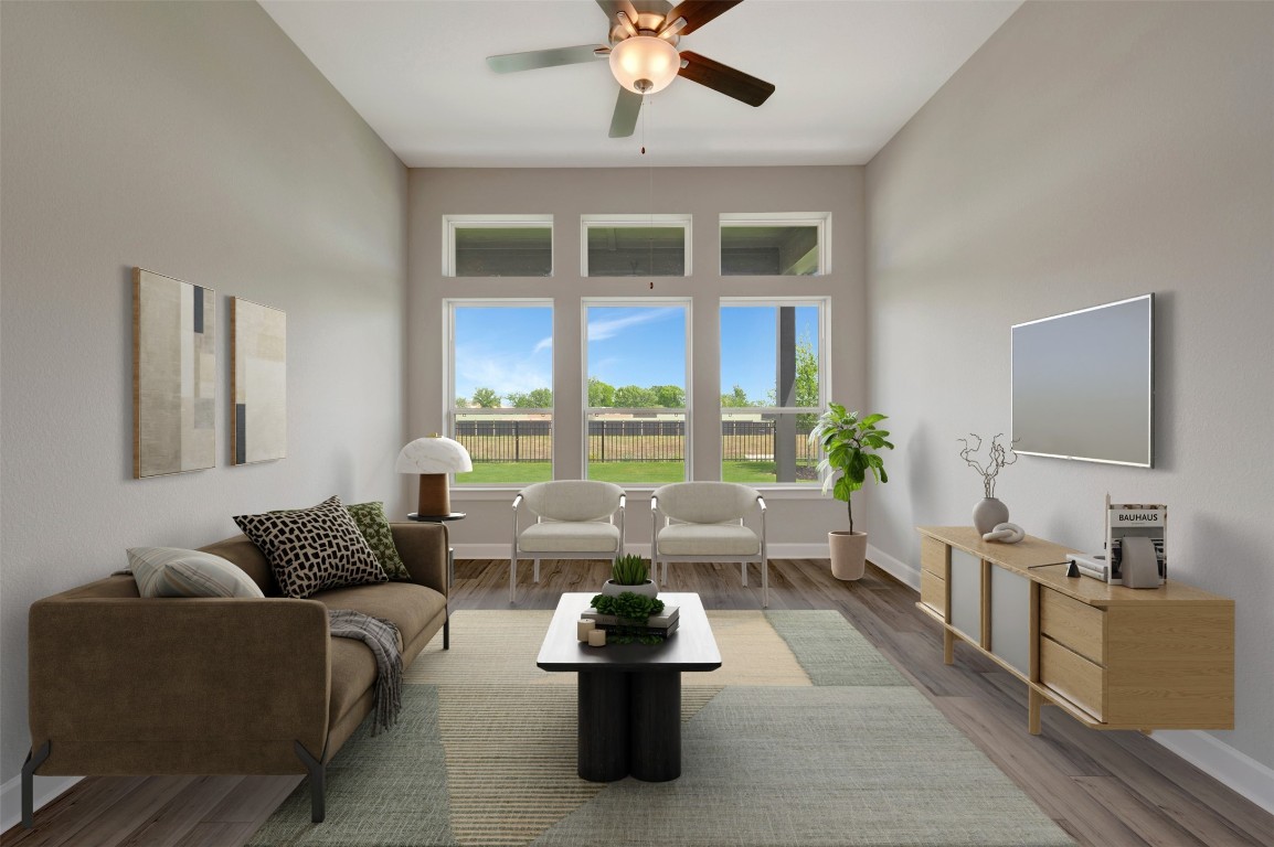 2423 Msn Hts Way Manvel, TX 77578 - Photo 7 of 49 a living room with furniture and a large window