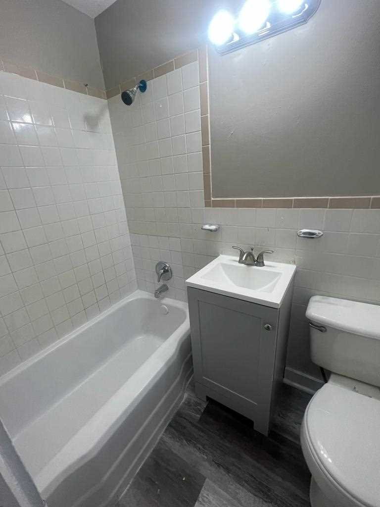 24-26 Spring Street, Unit 2 Wappingers Falls, NY 12590 - Photo 7 of 7 a bathroom with a sink and a toilet