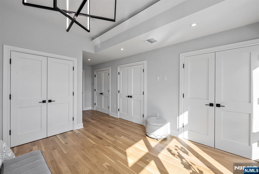 2449 Camner Street Fort Lee, NJ 07024 - Photo 27 of 49 a view of a bathroom with a bathtub and shower