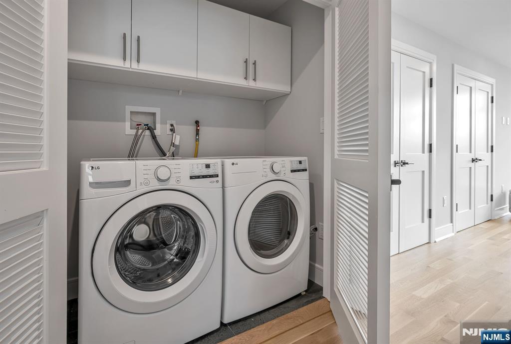 2449 Camner Street Fort Lee, NJ 07024 - Photo 37 of 49 a view of a storage & utility room with washer and dryer