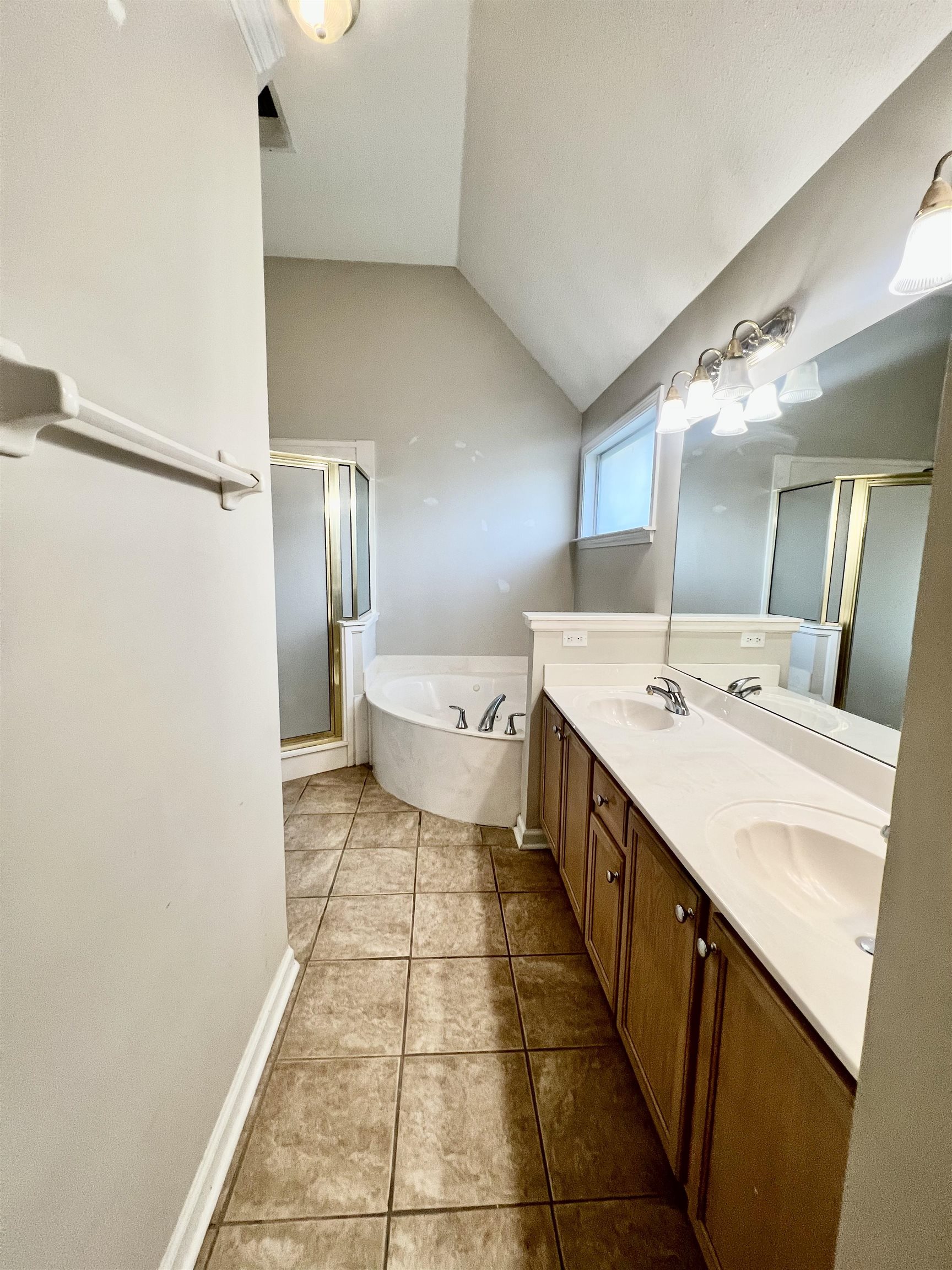 5645 Sycamore Ridge Road Memphis, TN 38134 - Photo 5 of 13 a bathroom with a double vanity sink and mirror