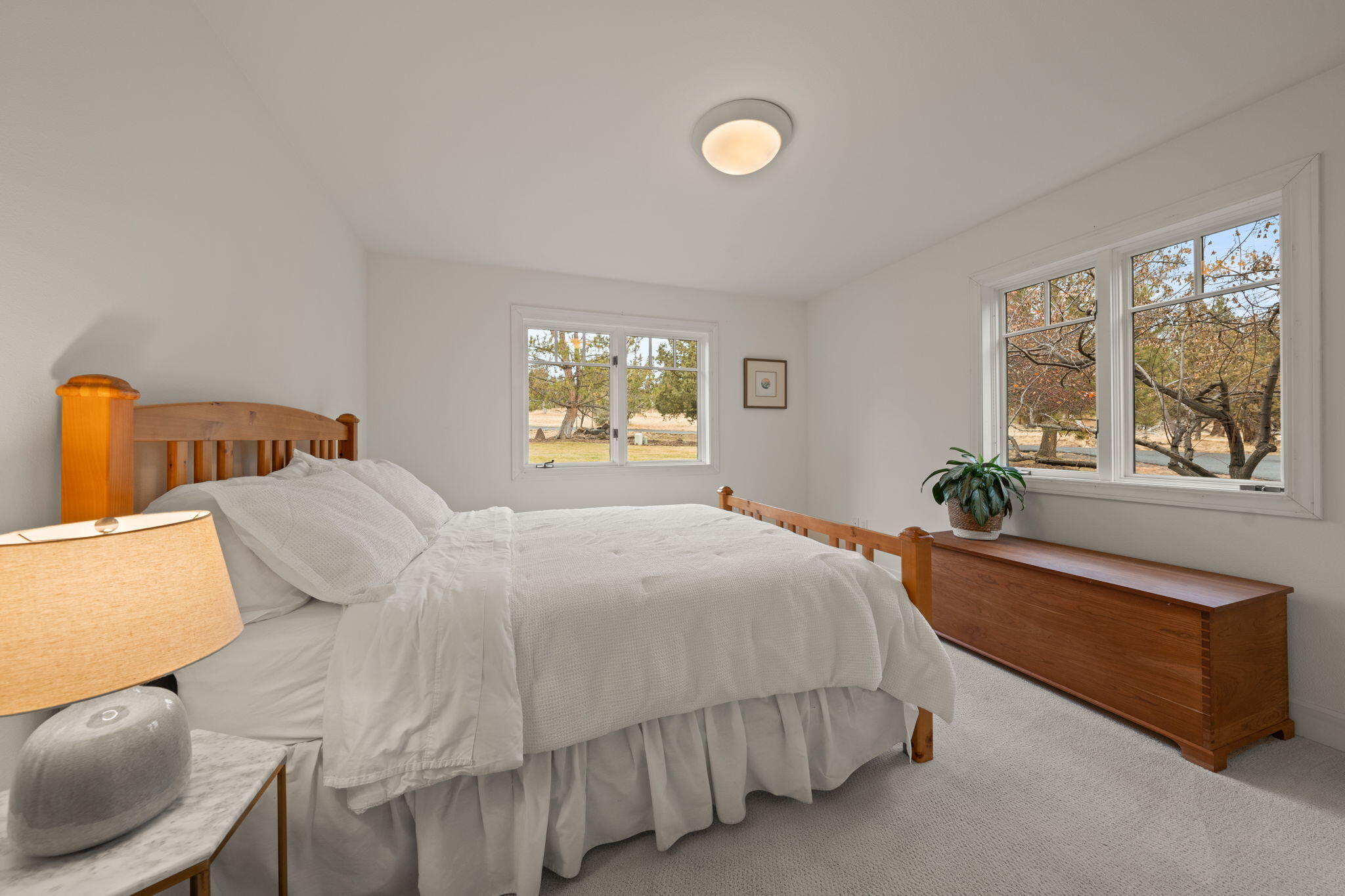 16045 Fox Ridge Circle Sisters, OR 97759 - Photo 18 of 40 Guest Bedroom with meadow view