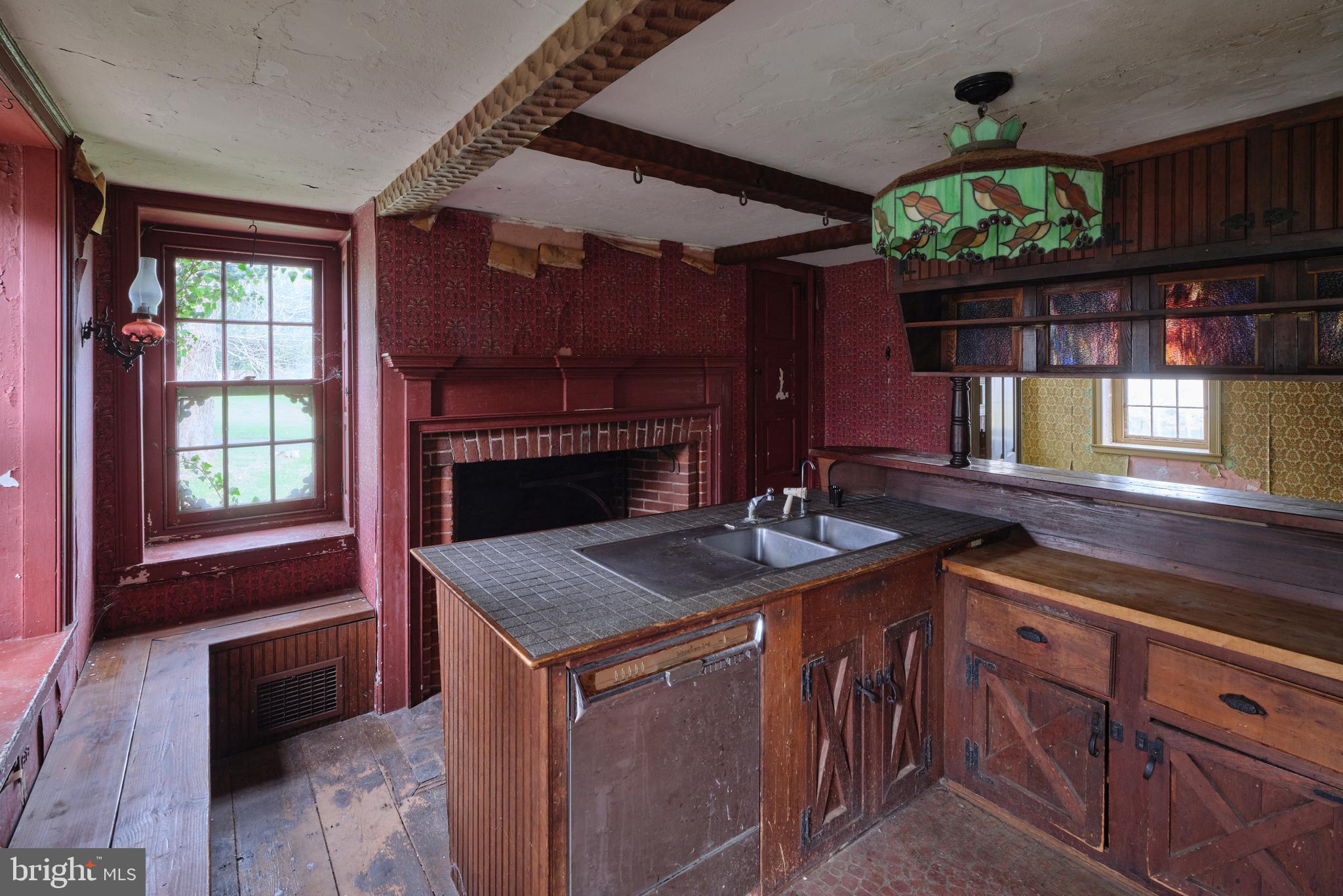 2519 Ash Mill Road Doylestown, PA 18902 - Photo 20 of 39 a kitchen with a sink stove and cabinets
