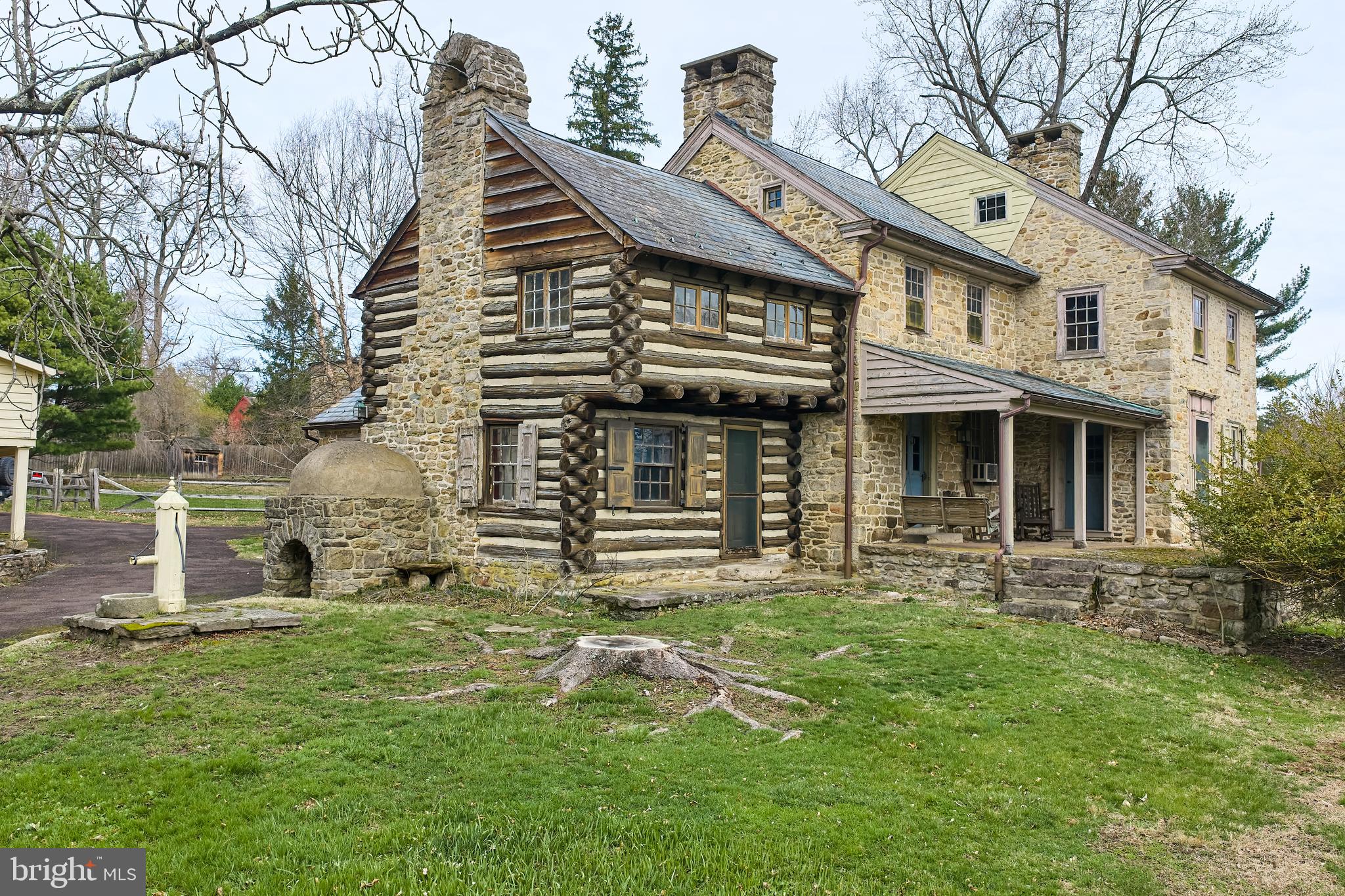 2519 Ash Mill Road Doylestown, PA 18902 - Photo 2 of 39 a front view of a house with a yard