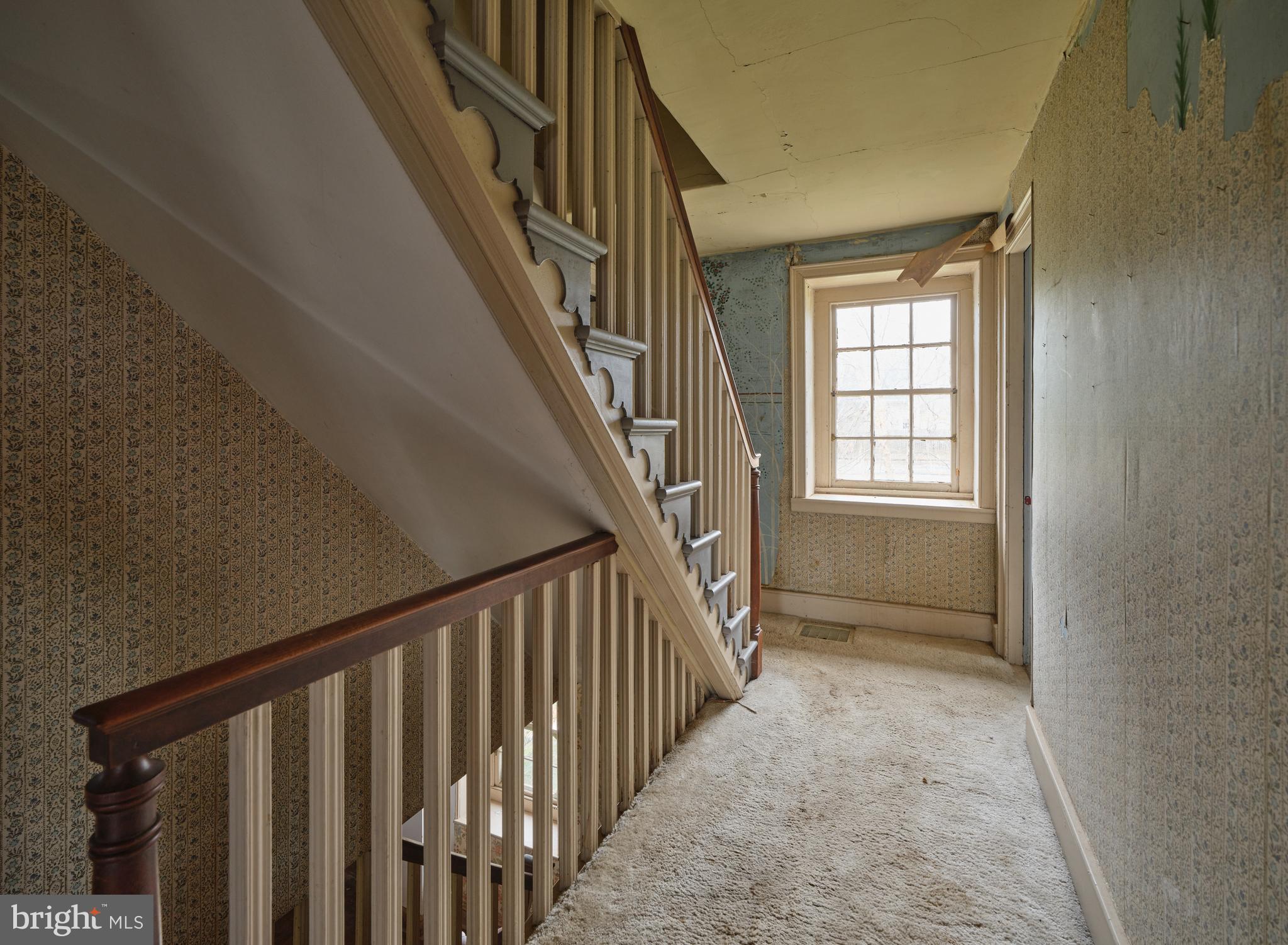 2519 Ash Mill Road Doylestown, PA 18902 - Photo 22 of 39 a view of an entryway wooden floor and stairs
