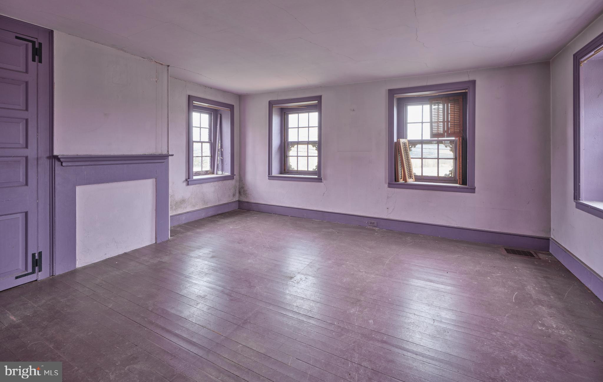 2519 Ash Mill Road Doylestown, PA 18902 - Photo 23 of 39 a view of an empty room with wooden floor and a window