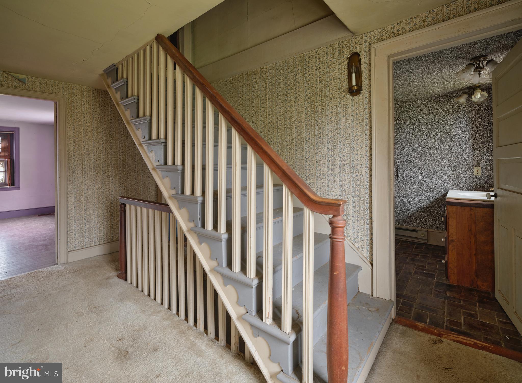2519 Ash Mill Road Doylestown, PA 18902 - Photo 26 of 39 a view of a hallway with wooden floor and entryway