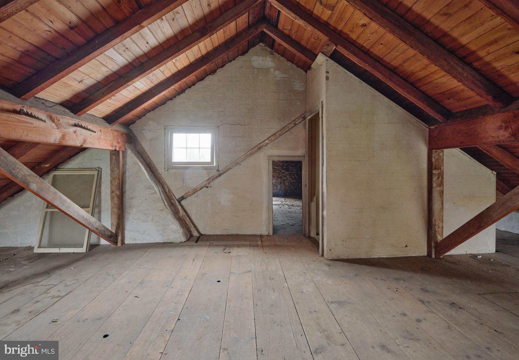 2519 Ash Mill Road Doylestown, PA 18902 - Photo 28 of 39 a view of an empty room with wooden floor