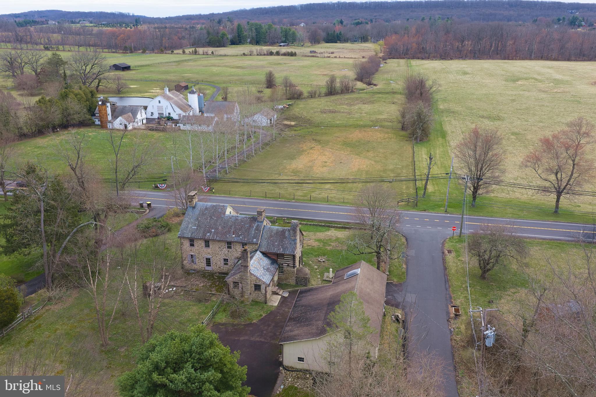 2519 Ash Mill Road Doylestown, PA 18902 - Photo 38 of 39 an aerial view of a house with a lake view