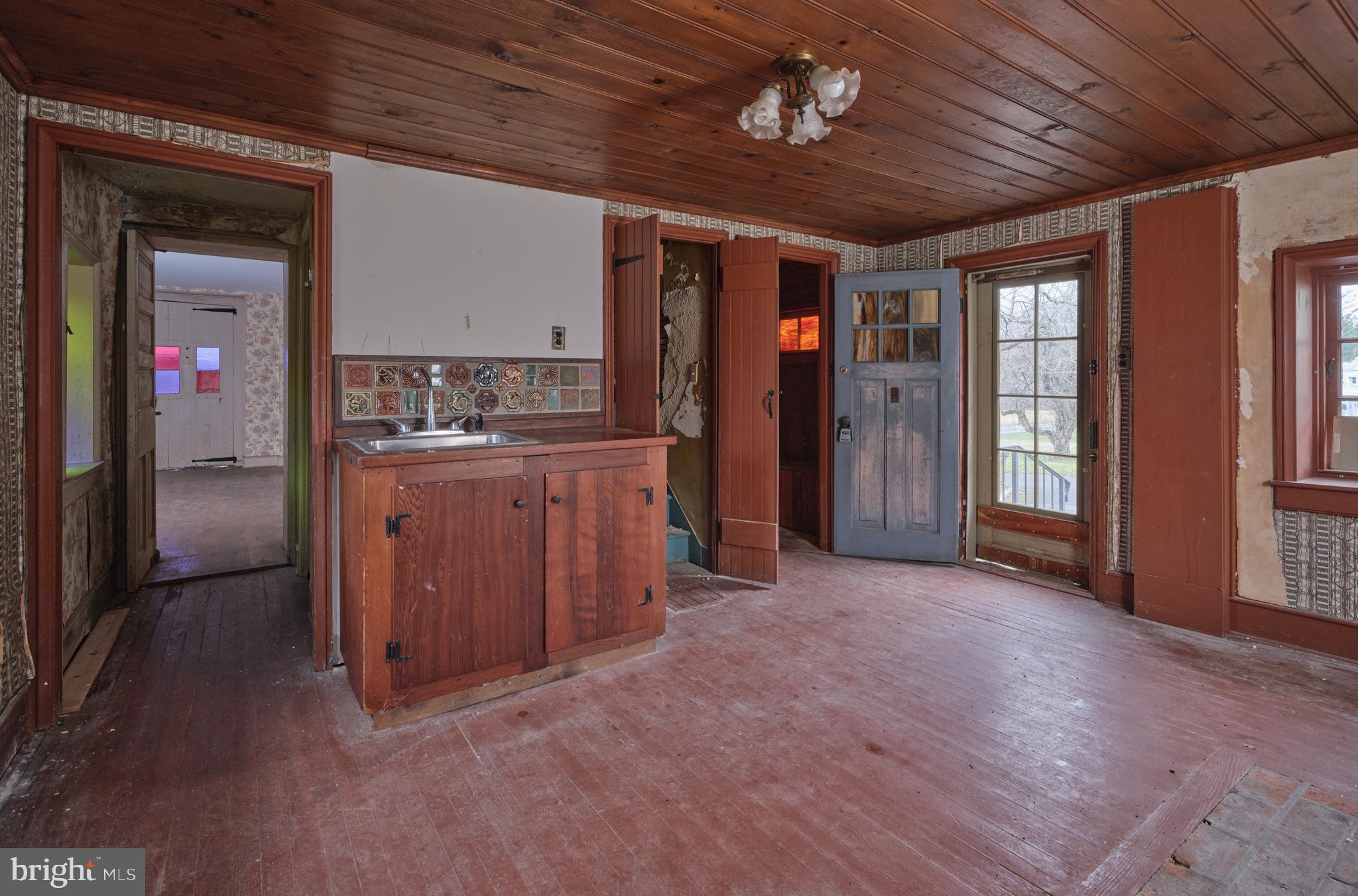 2519 Ash Mill Road Doylestown, PA 18902 - Photo 7 of 39 wooden floor in an empty room with a kitchen