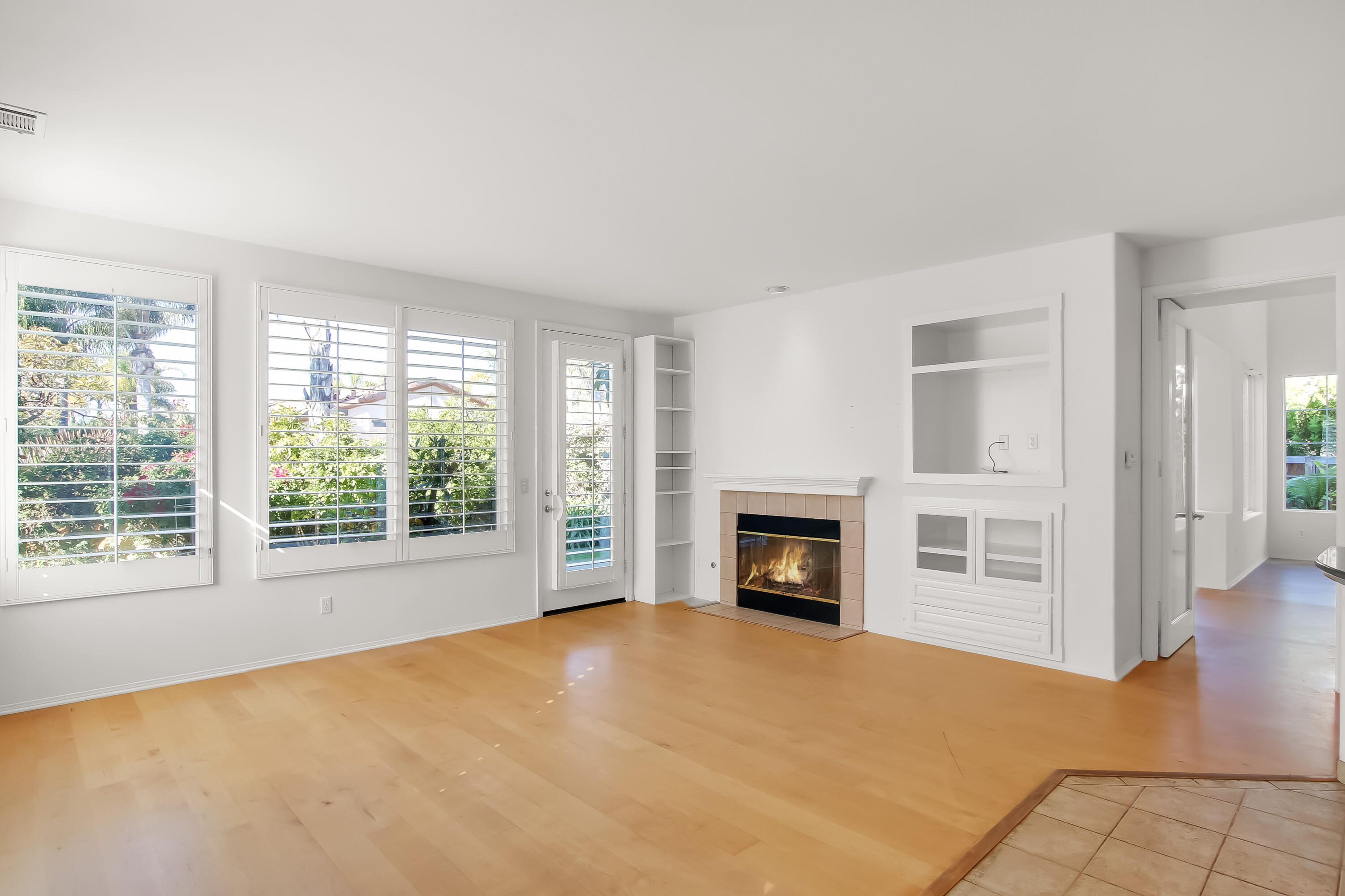 6866 Shadowbrook Drive Goleta, CA 93117 - Photo 19 of 33 TV/FP/Family room to patio/yard outside