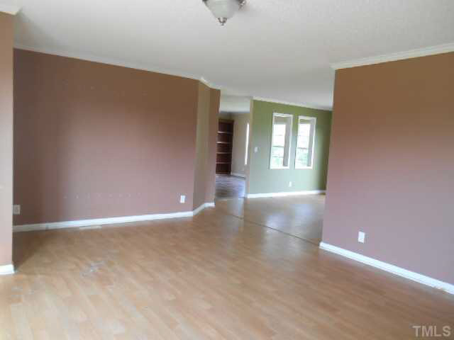 1353 Pixley Pritchard Road Timberlake, NC 27583 - Photo 4 of 12 a view of an empty room with a window