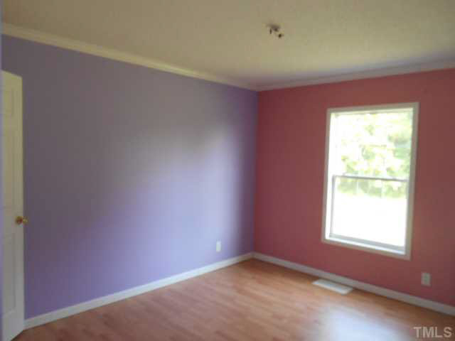 1353 Pixley Pritchard Road Timberlake, NC 27583 - Photo 6 of 12 an empty room with a window