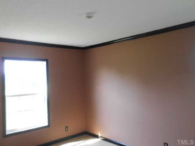 1353 Pixley Pritchard Road Timberlake, NC 27583 - Photo 7 of 12 a view of an empty room