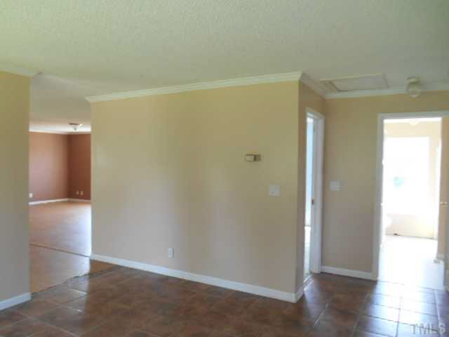 1353 Pixley Pritchard Road Timberlake, NC 27583 - Photo 10 of 12 a view of an empty room