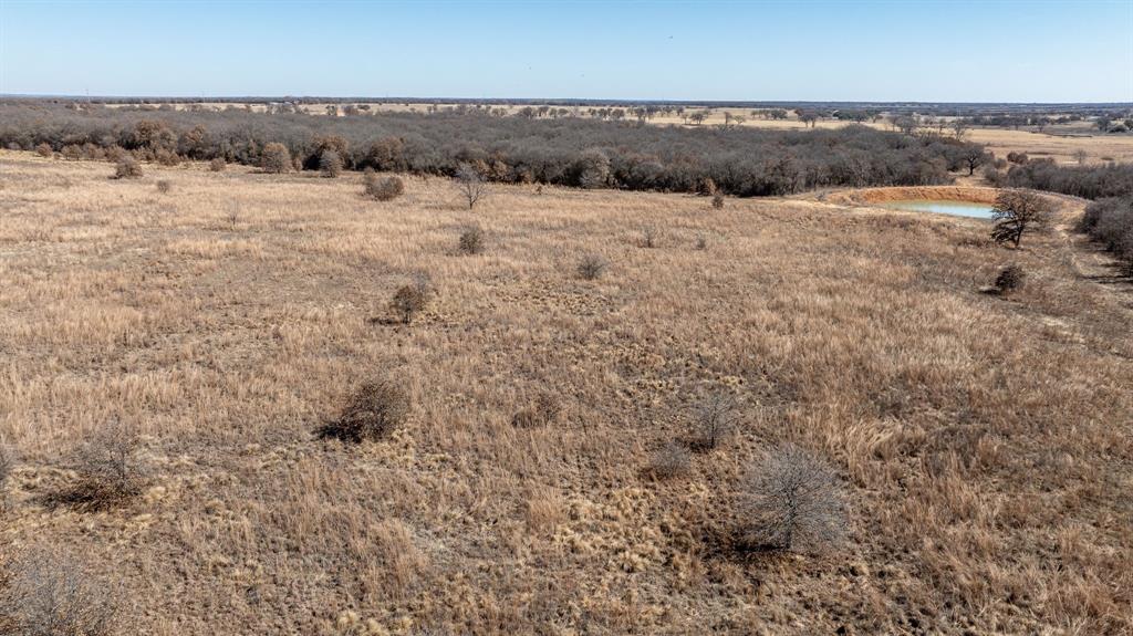 0 County Road 380 Carbon, TX 76435 - Photo 29 of 38 an aerial view of houses covered in snow