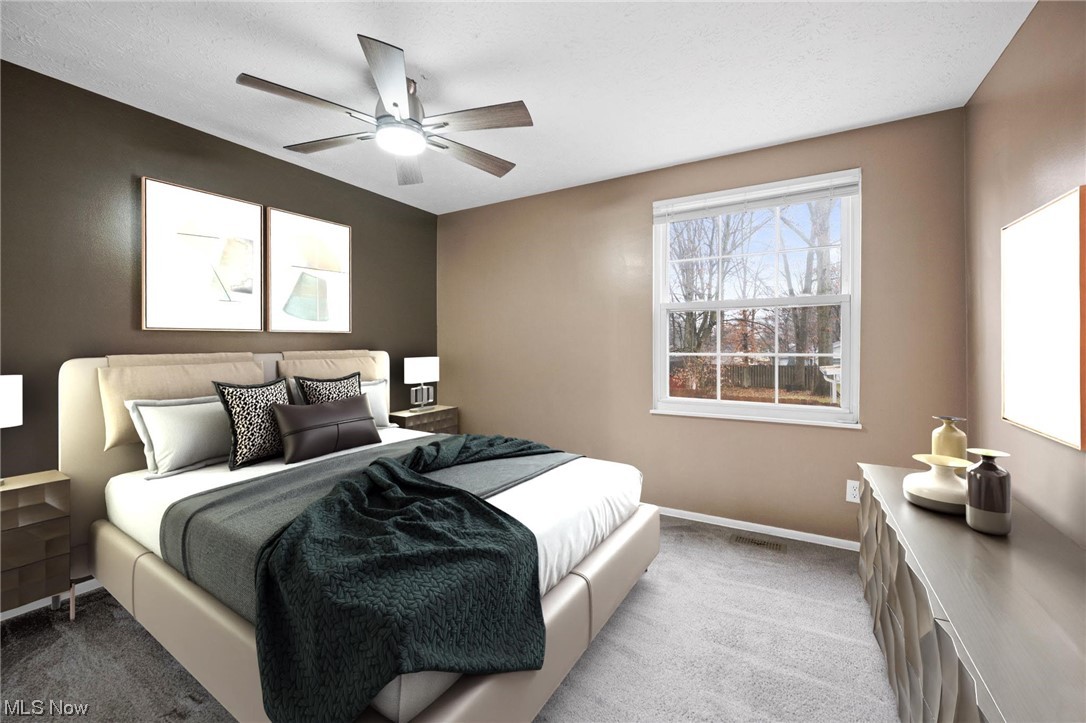 4251 Kenneth Road Stow, OH 44224 - Photo 8 of 19 Carpeted bedroom featuring ceiling fan