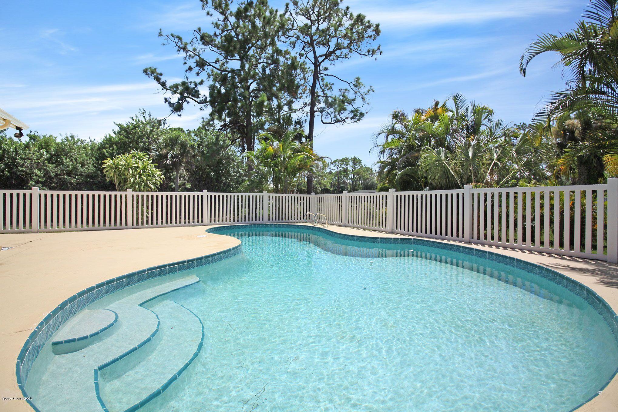 4521 Mustang Road Melbourne, FL 32934 - Photo 3 of 24 a view of a backyard