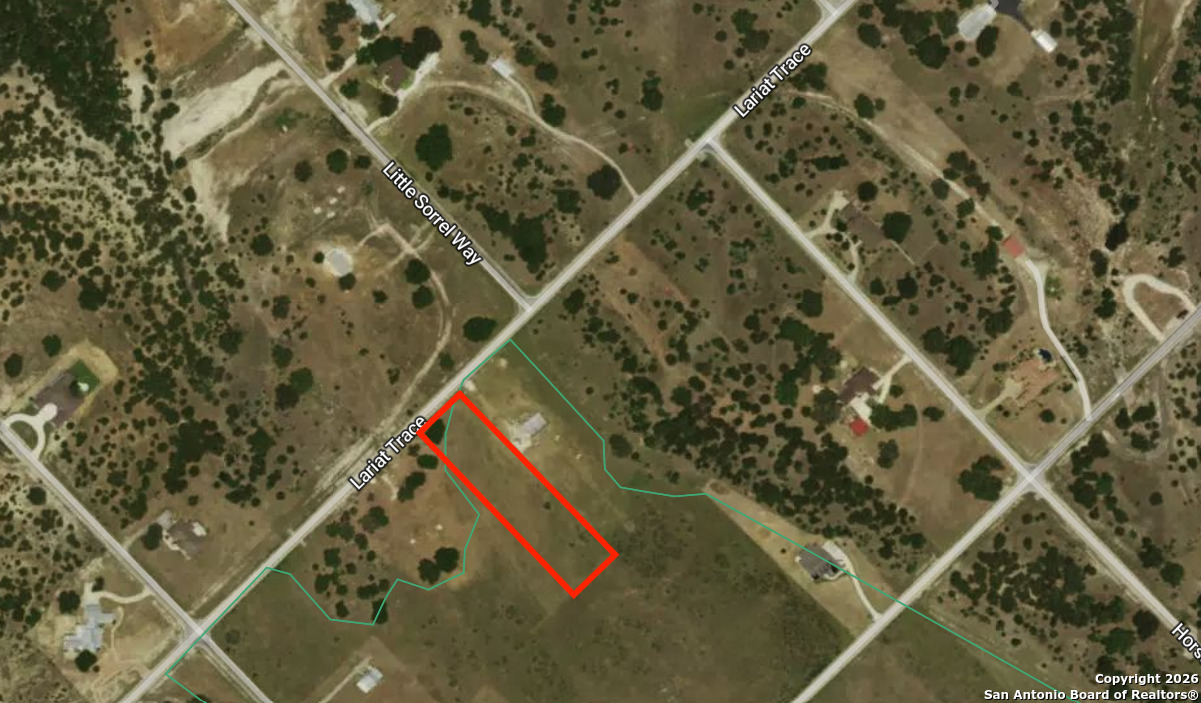 1148 Lariat Trace Bandera, TX 78003 - Photo 4 of 4 an aerial view of a tennis court