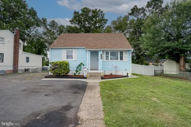 a house view with a garden space