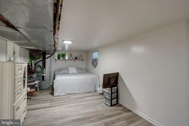 a bedroom with furniture