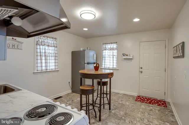 a room with furniture and window