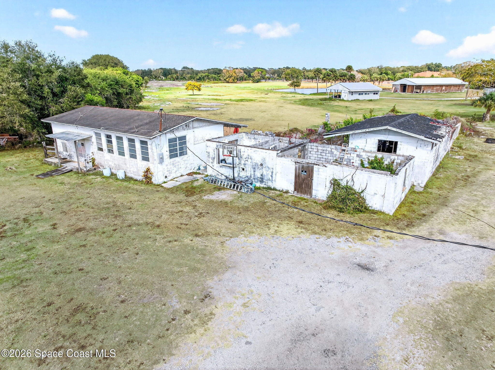 3825 Turtle Mound Road Melbourne, FL 32934 - Photo 18 of 19 a view of a city with an ocean beach