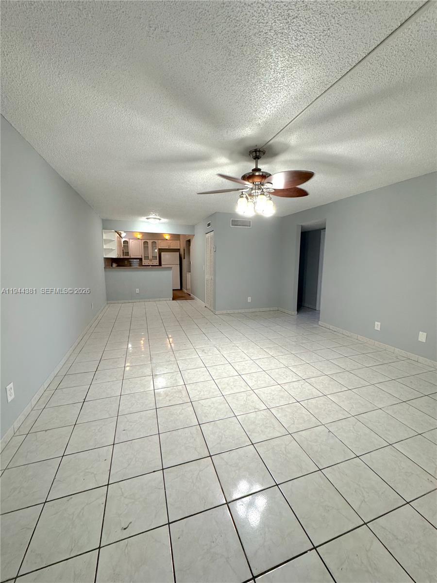 8536 Southwest 156th Court, Unit 210 Miami, FL 33193 - Photo 16 of 17 a view of a livingroom with natural light