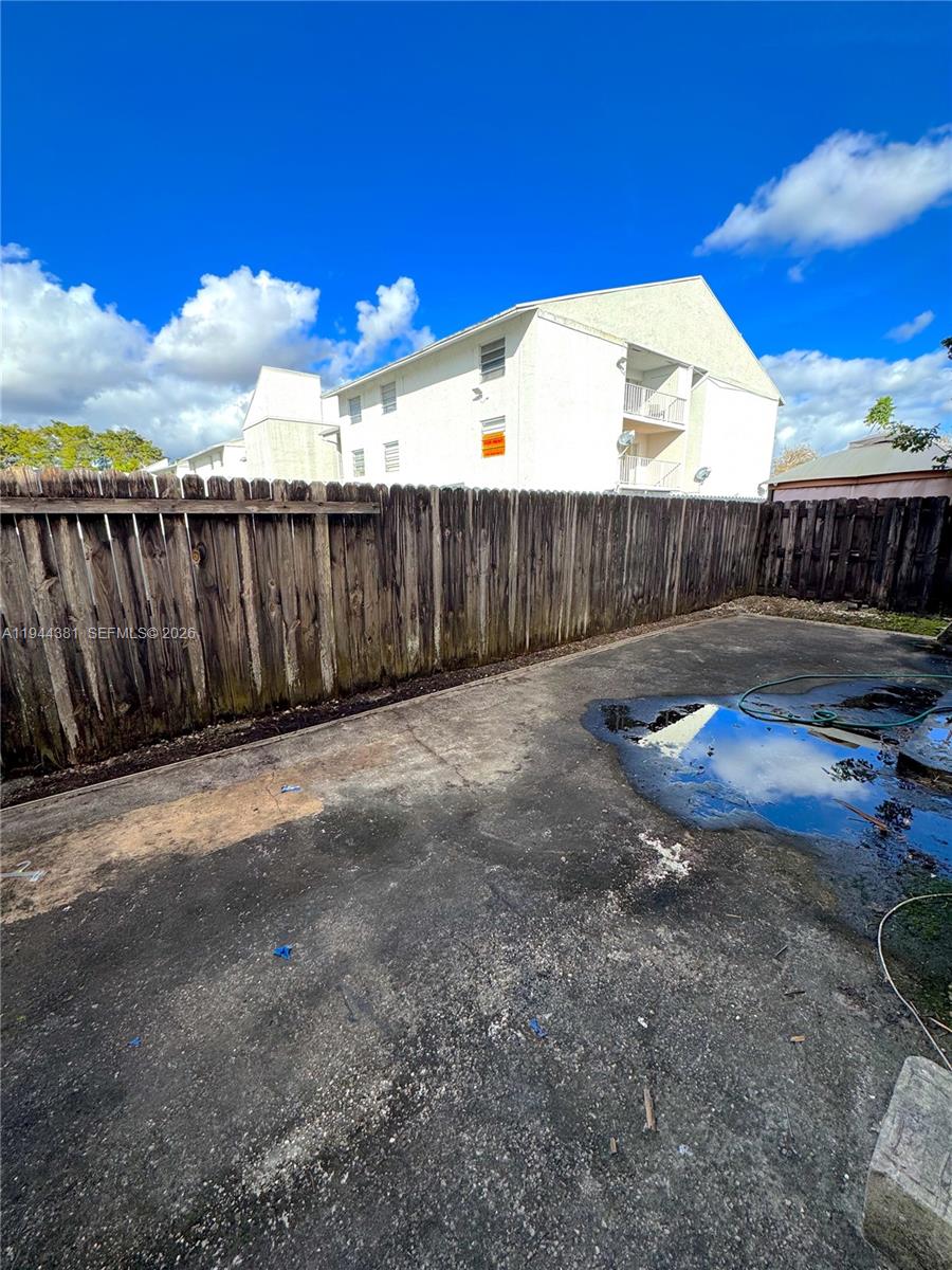 8536 Southwest 156th Court, Unit 210 Miami, FL 33193 - Photo 17 of 17 a view of a backyard