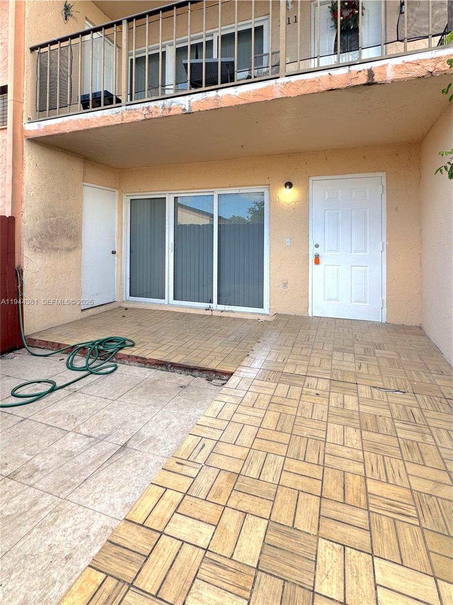 8536 Southwest 156th Court, Unit 210 Miami, FL 33193 - Photo 4 of 17 a front view of a building