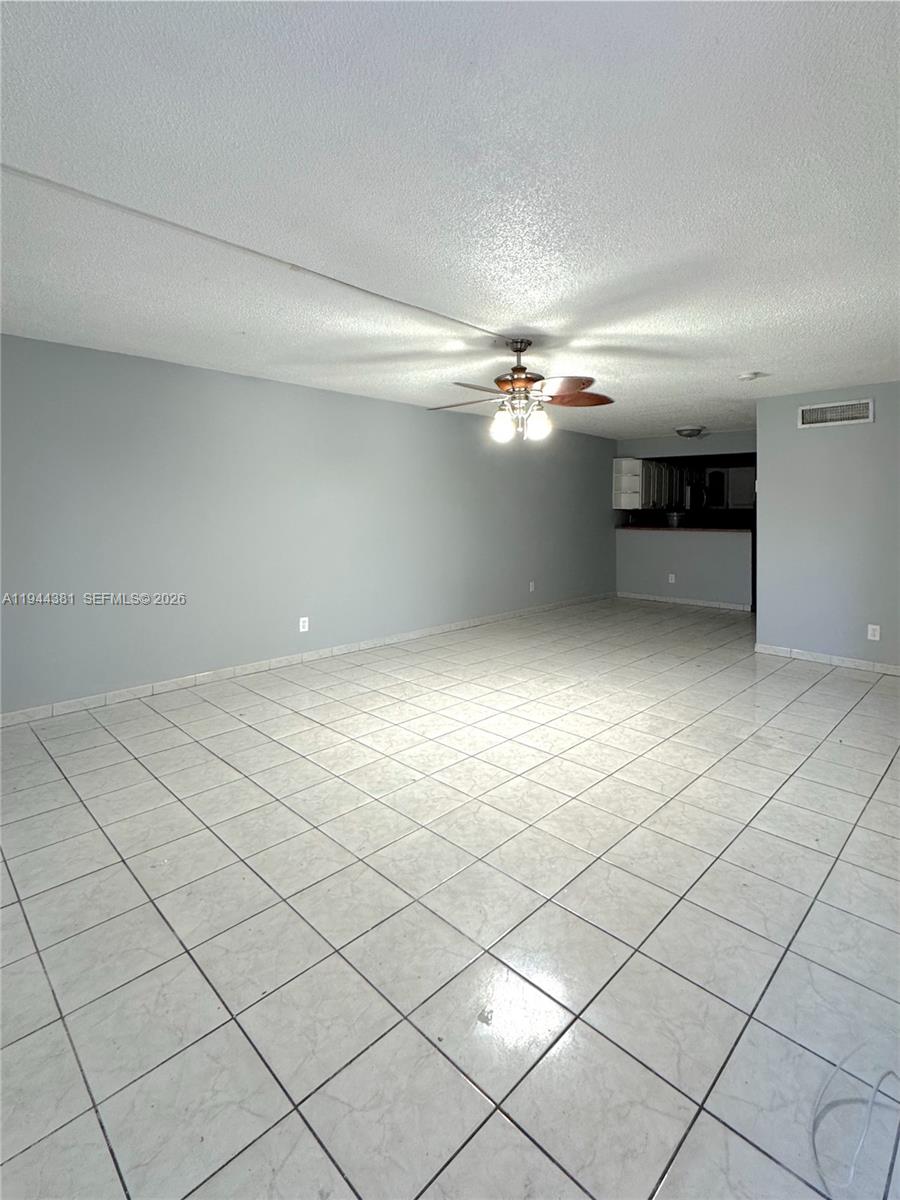 8536 Southwest 156th Court, Unit 210 Miami, FL 33193 - Photo 5 of 17 a view of a livingroom and entryway